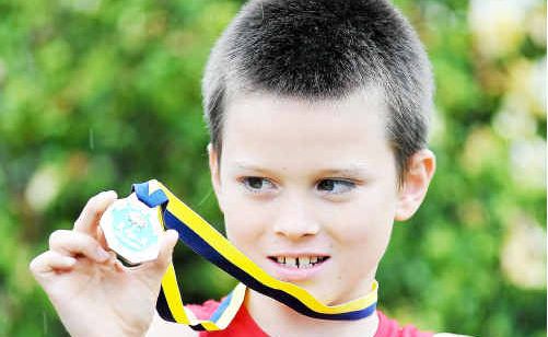 Aquathlon gold medal winner Ky Sullivan of Boambee. Aquathlon gold medal winner Ky Sullivan of Boambee.